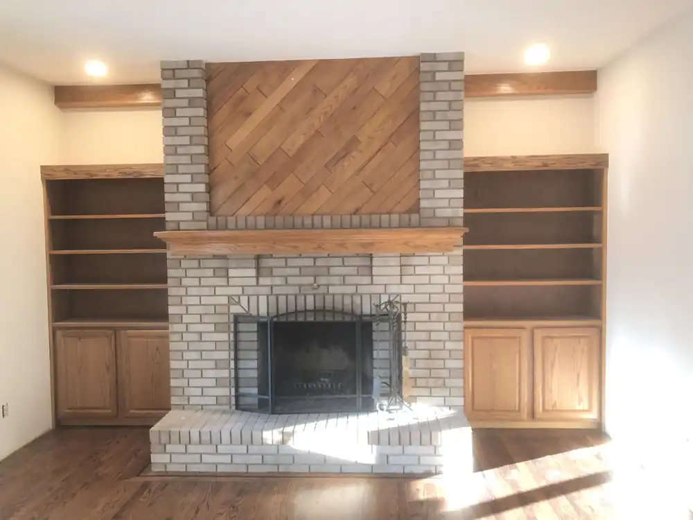 Fireplace wall and built-ins, freshly painted
