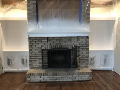 Painted brick fireplace